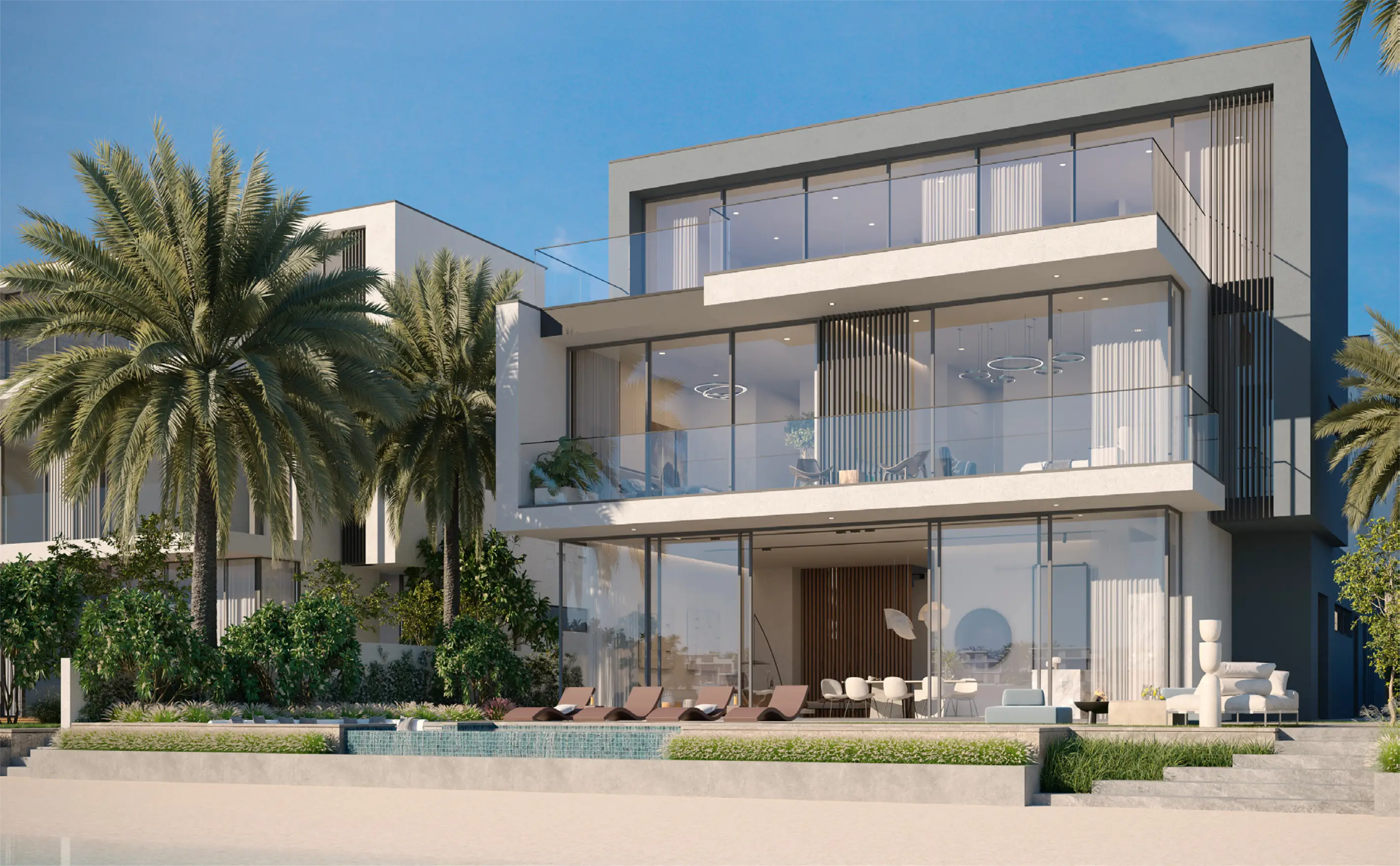 A luxury villa with a private pool overlooking the beach at Palm Jebel Ali.