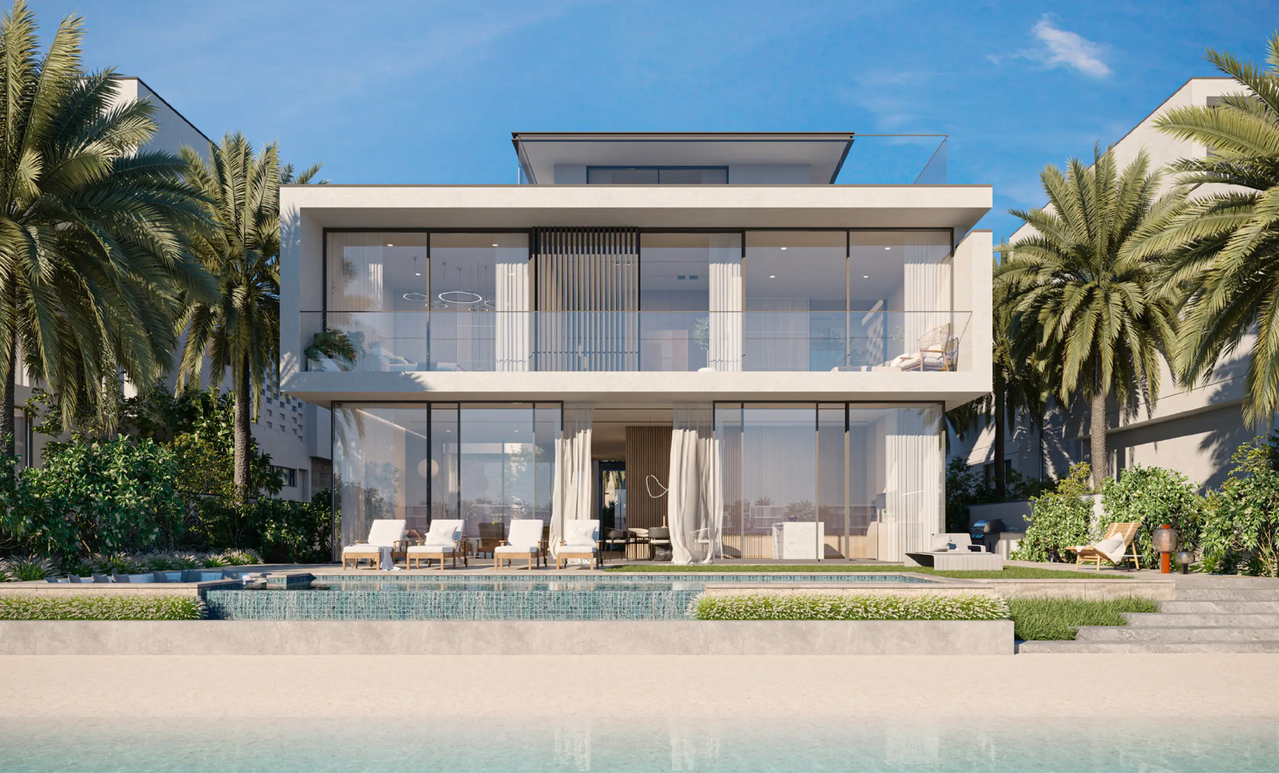 A luxury villa with a private pool overlooking the beach at Palm Jebel Ali.