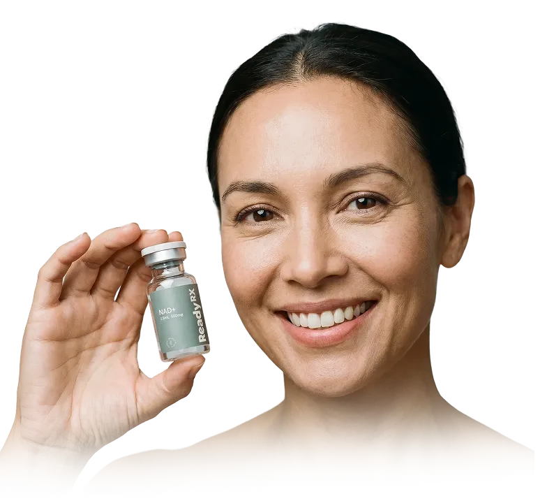 Smiling woman holding a small vial labeled ReadyRX NAD+ 12ml 500mg.