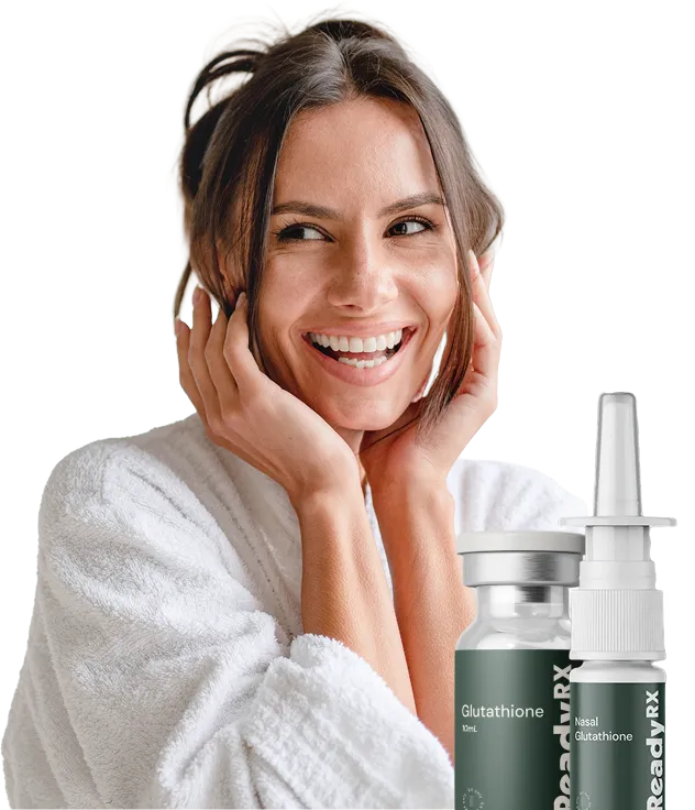 Smiling woman in white towel with glutathione products displayed beside her.