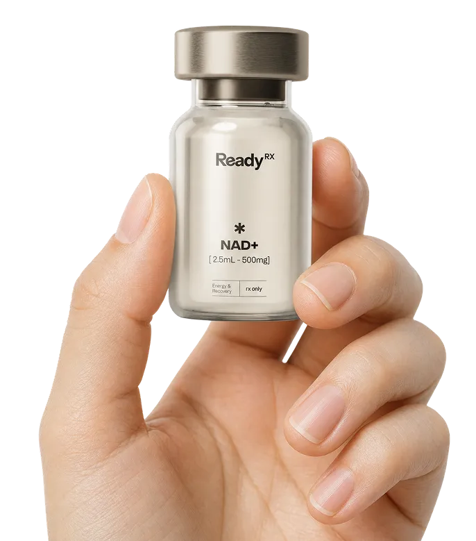 Hand holding ReadyRx NAD+ supplement vial, 2.5mL-500mg dosage on white background