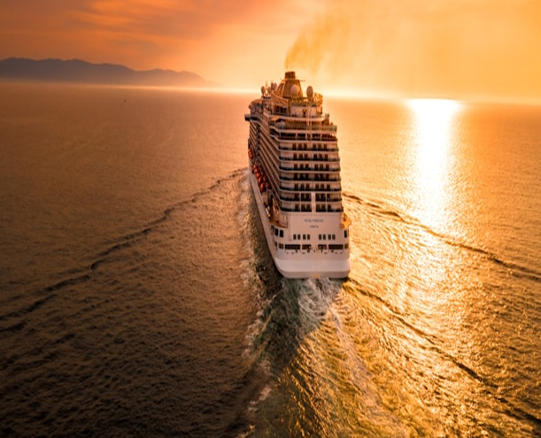 cruise ship on sunset ocean