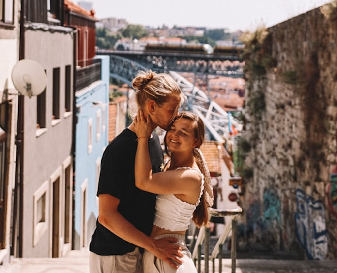 couple embracing each other in european streets