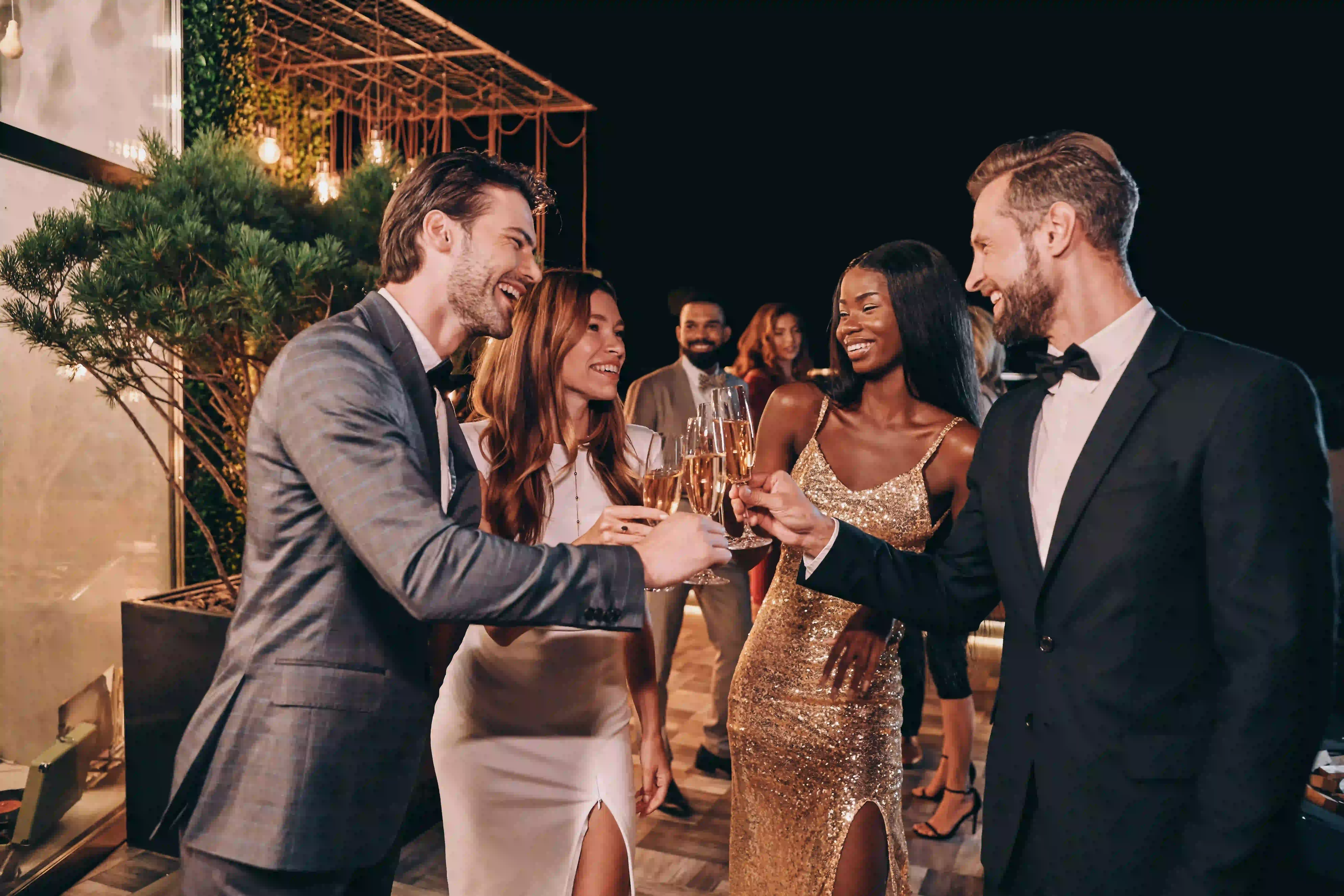 group of wedding guest cheersing champagne