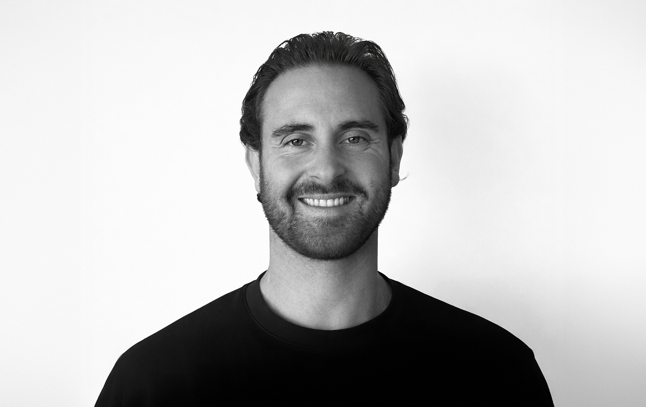 Studio photograph of Ste Bell in black and white