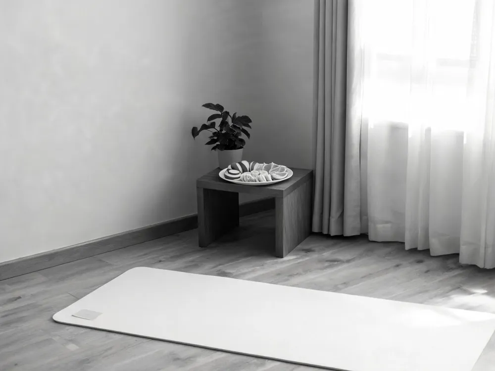 Scene of a woman doing gentle prenatal yoga and walking, surrounded by healthy foods, emphasizing pelvic‑floor strengthening and optimal inter‑pregnancy spacing before attempting VBAC.