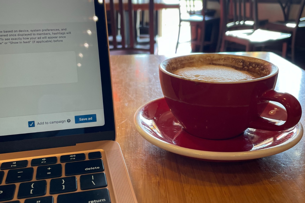 Freelance creative marketer Alexa Phillips at a coffee shop.