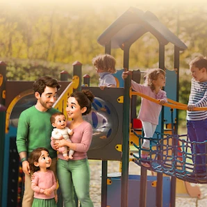 Famille heureuse avec ses enfants à l'aire de jeux