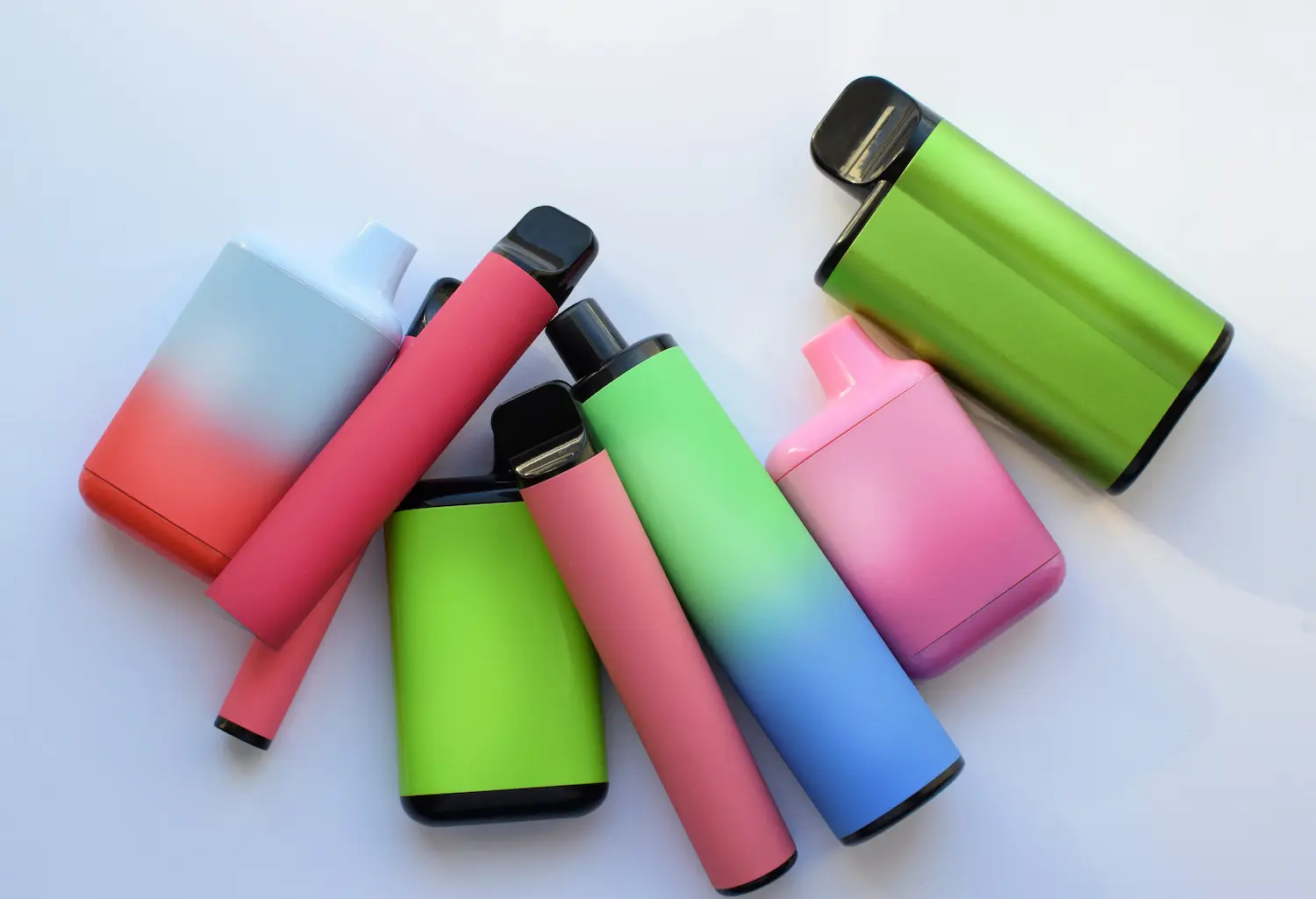 a collection of colorful vapes