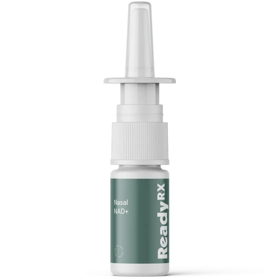 A white nasal spray bottle with a green label that reads Ready RX and NAD+ Nasal Spray stands upright on a plain background, reflecting science-based care for personalized plans.