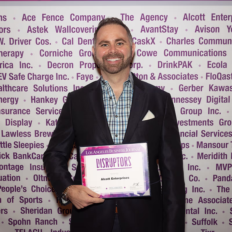 Our Story | Jordan Alcott at the LA Business Journal Disruptor Awards 2024.  Alcott Enterprises – IT Innovation Starts Here