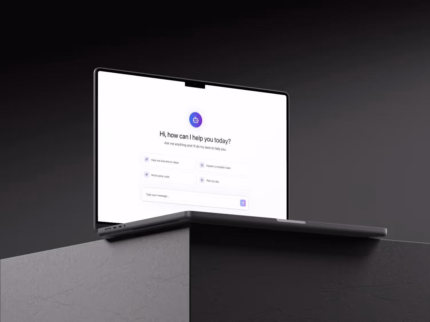 A modern laptop, open and displaying a user interface for an AI assistant, is positioned on a dark, geometric block or surface. The screen shows a greeting "Hi, how can I help you today?" and offers several prompt suggestions like "Help me brainstorm ideas," "Explain a complex topic," "Write some code," and "Plan my day." A prompt input field is at the bottom. The laptop and surface are set against a dark, plain background, with subtle lighting highlighting their forms.
