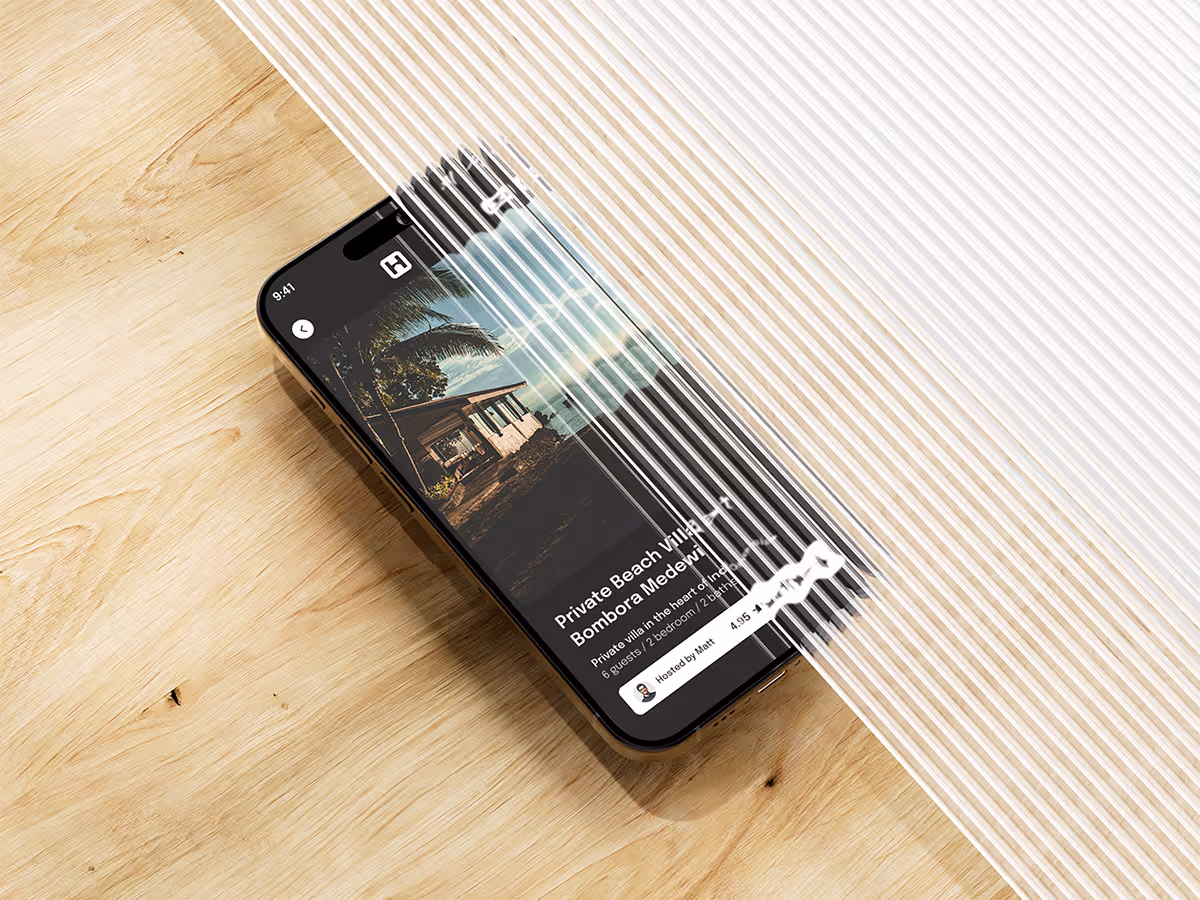 A smartphone lies diagonally on a wooden surface, displaying a "Private Beach Villa" listing. White and light brown diagonal stripes overlay part of the image, and light streaks across the phone's screen.