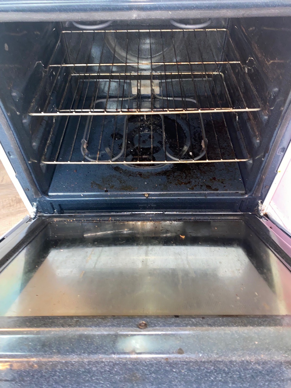 Before photo of detailed oven cleaning