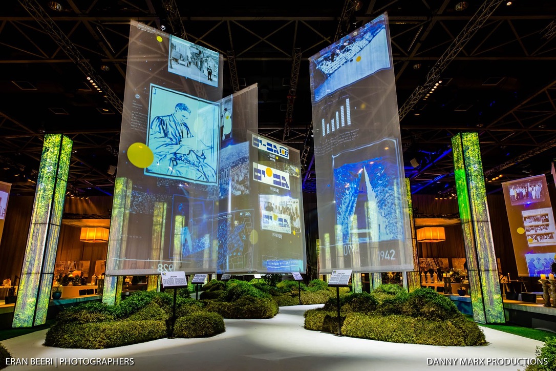 Projection screens and light pillars showcasing Gav-Yam 90-year celebration