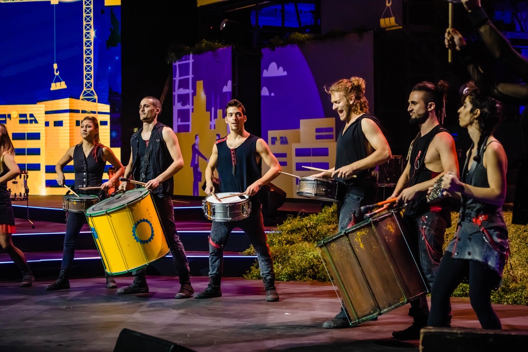 Drummers performing live on stage during Gav-Yam 90th anniversary celebration.