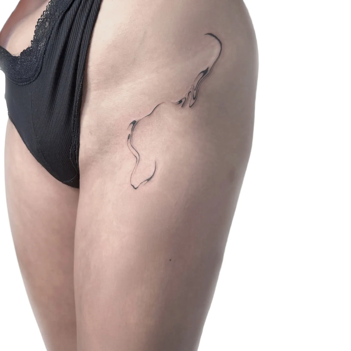 suminagashi tattoo on thigh