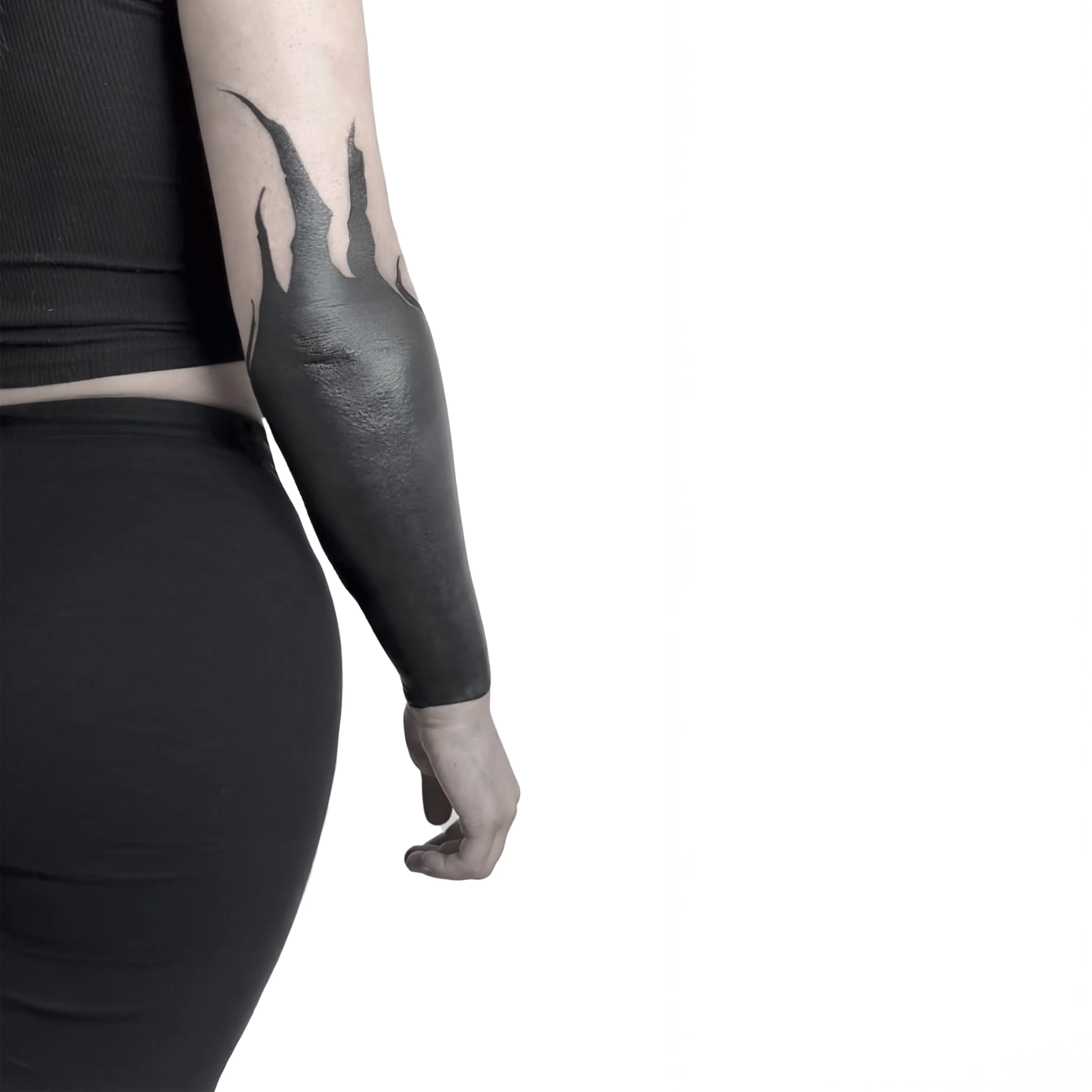 Blackout tattoo on arm