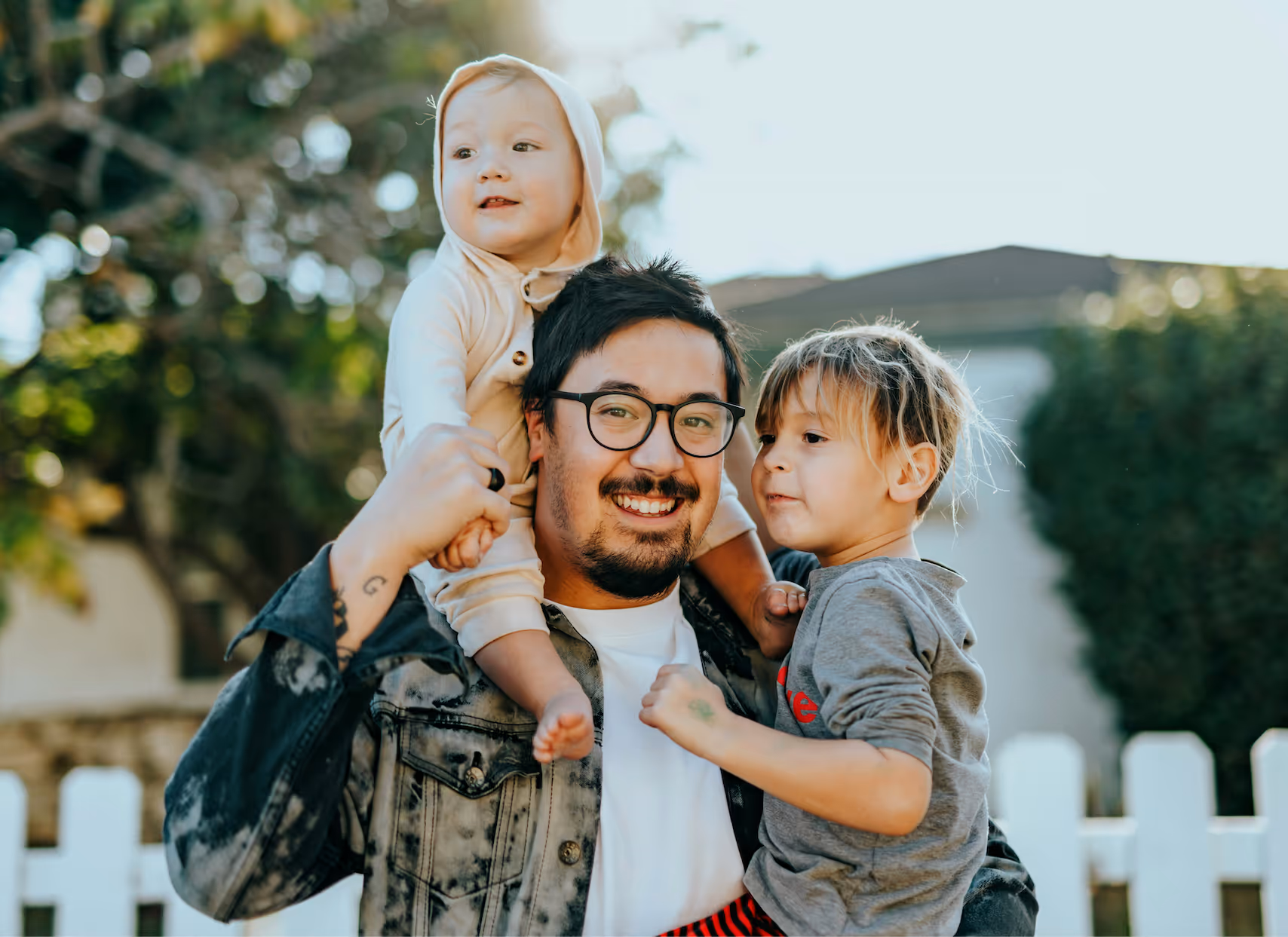Dad Holding his two kids for a family photo