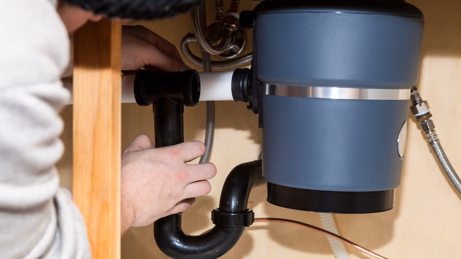 Garbage disposal under a sink