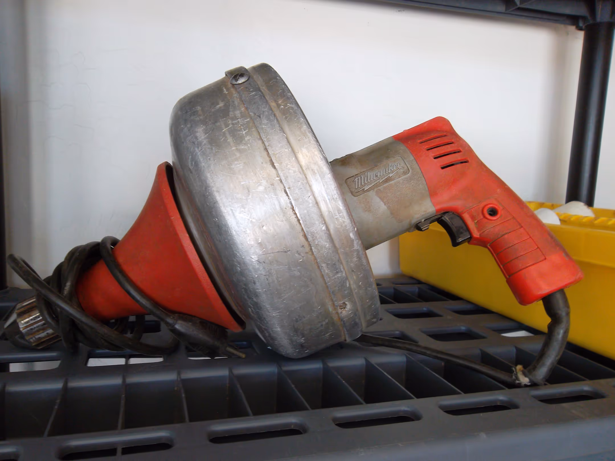 Handheld drain auger also known as a drain snake