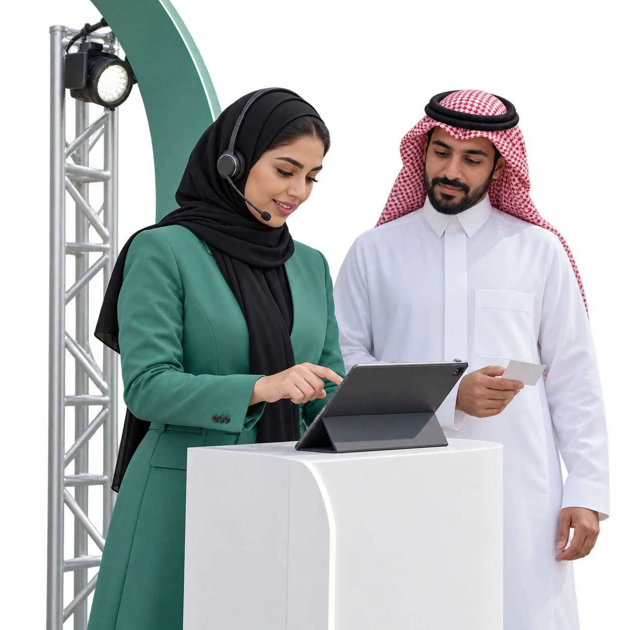 Saudi event coordinator assisting a visitor at an entertainment venue welcome point