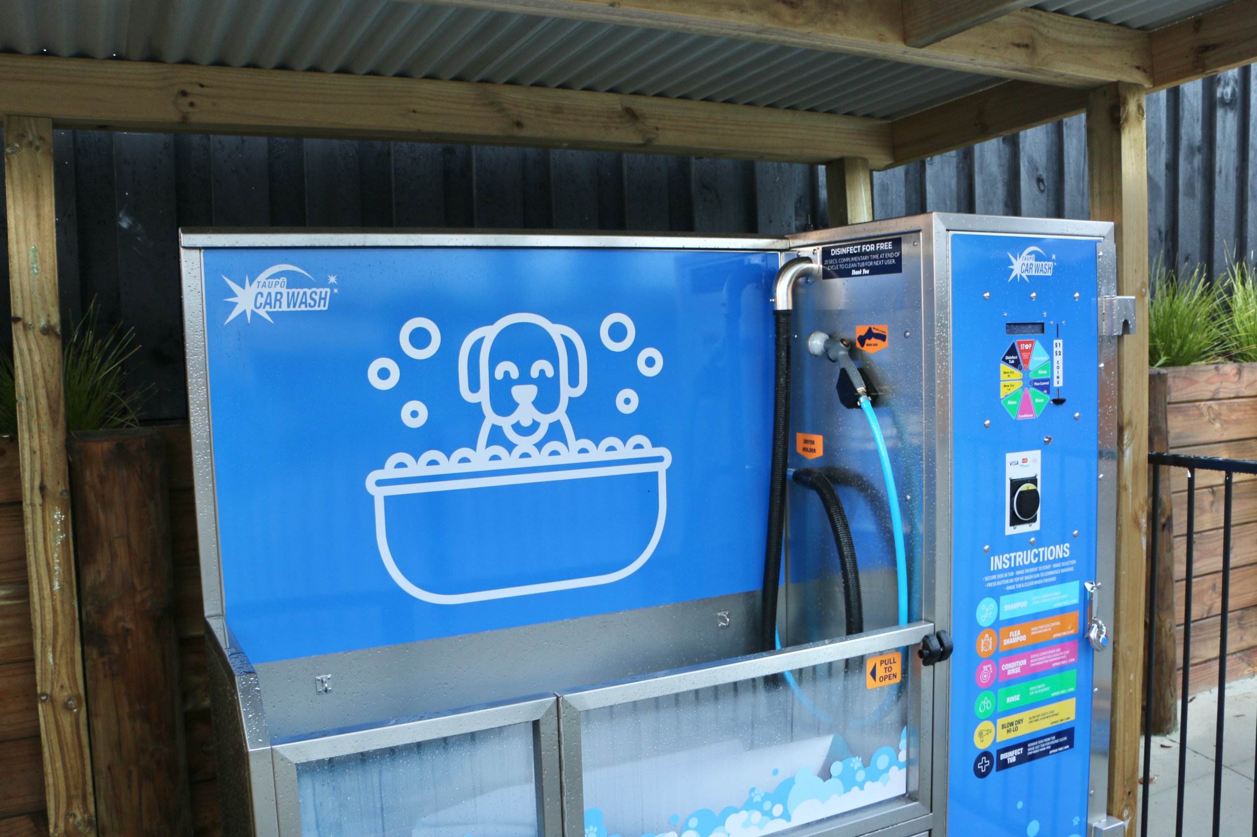 Self-service dog wash station