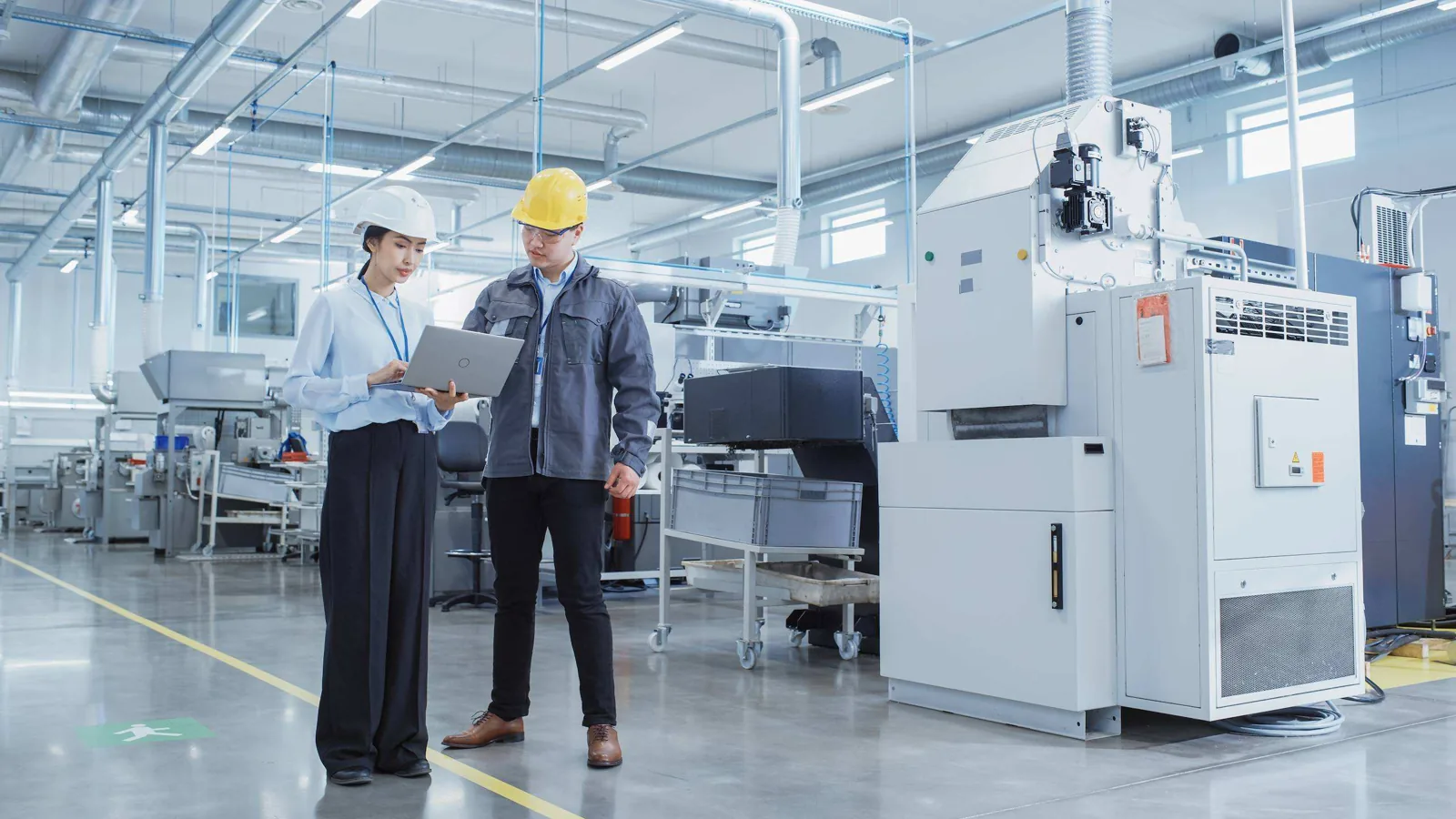 Factory inspection with hard hats.