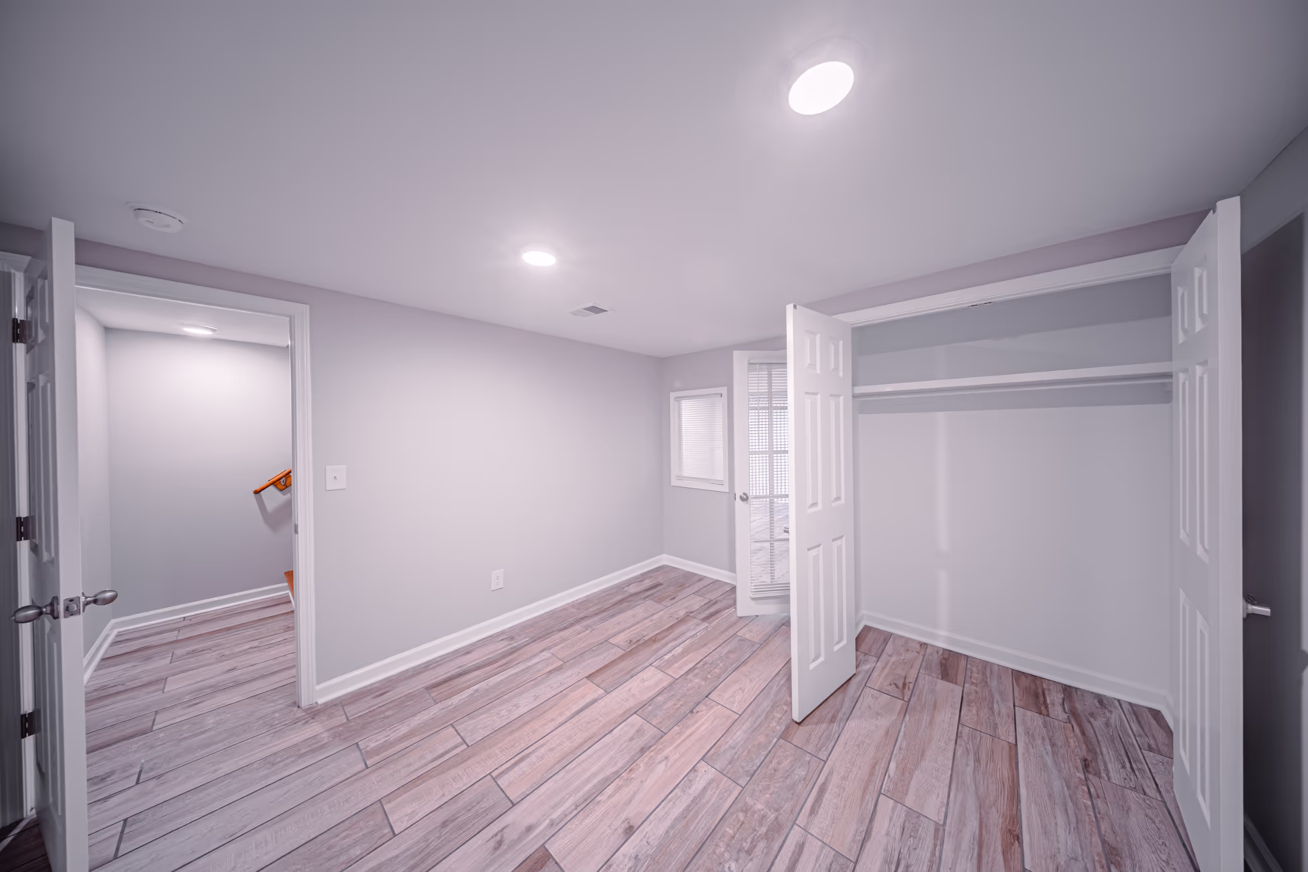 Bright and cozy bedroom interior at The Ridge Apartments in Marietta, GA