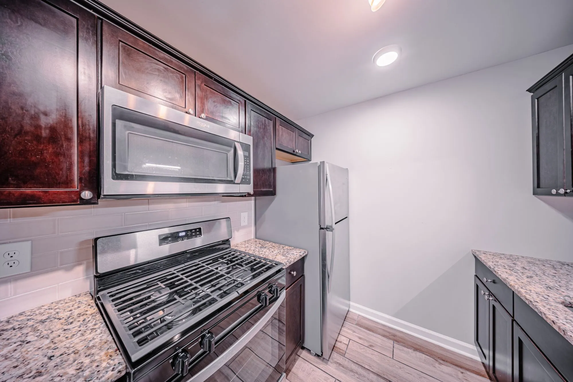 Updated kitchen with quartz countertops at The Ridge Apartments in Marietta, GA