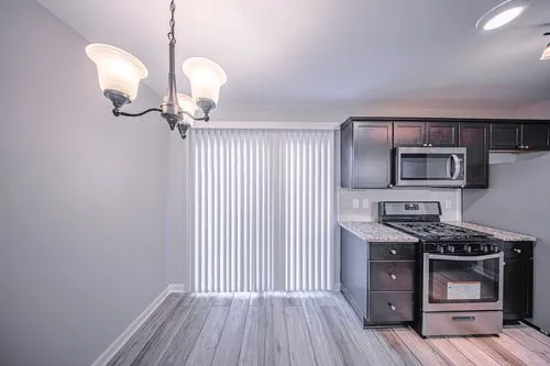 Apartment kitchen with stainless steel appliances at The Ridge Apartments in Marietta, GA
