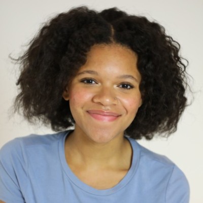 a headshot of Milan