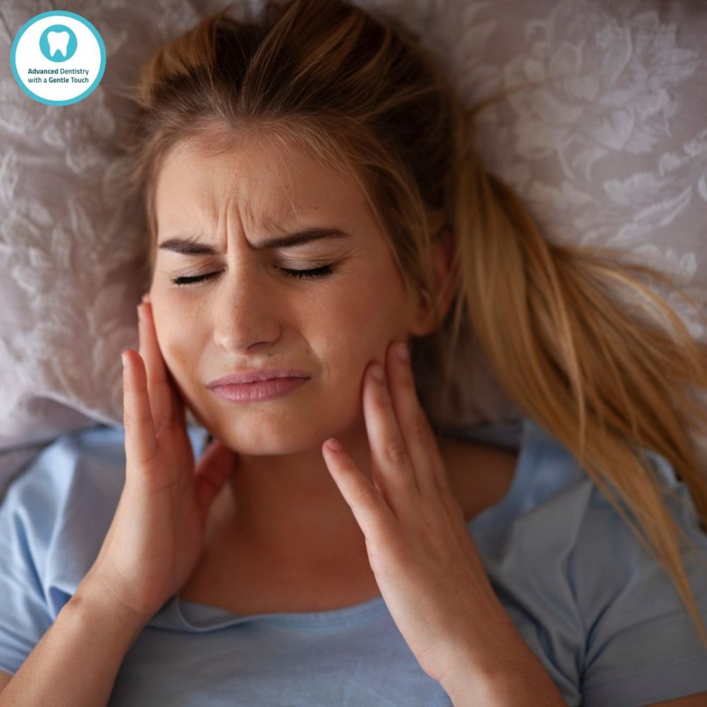 A woman with tmj jaw popping
