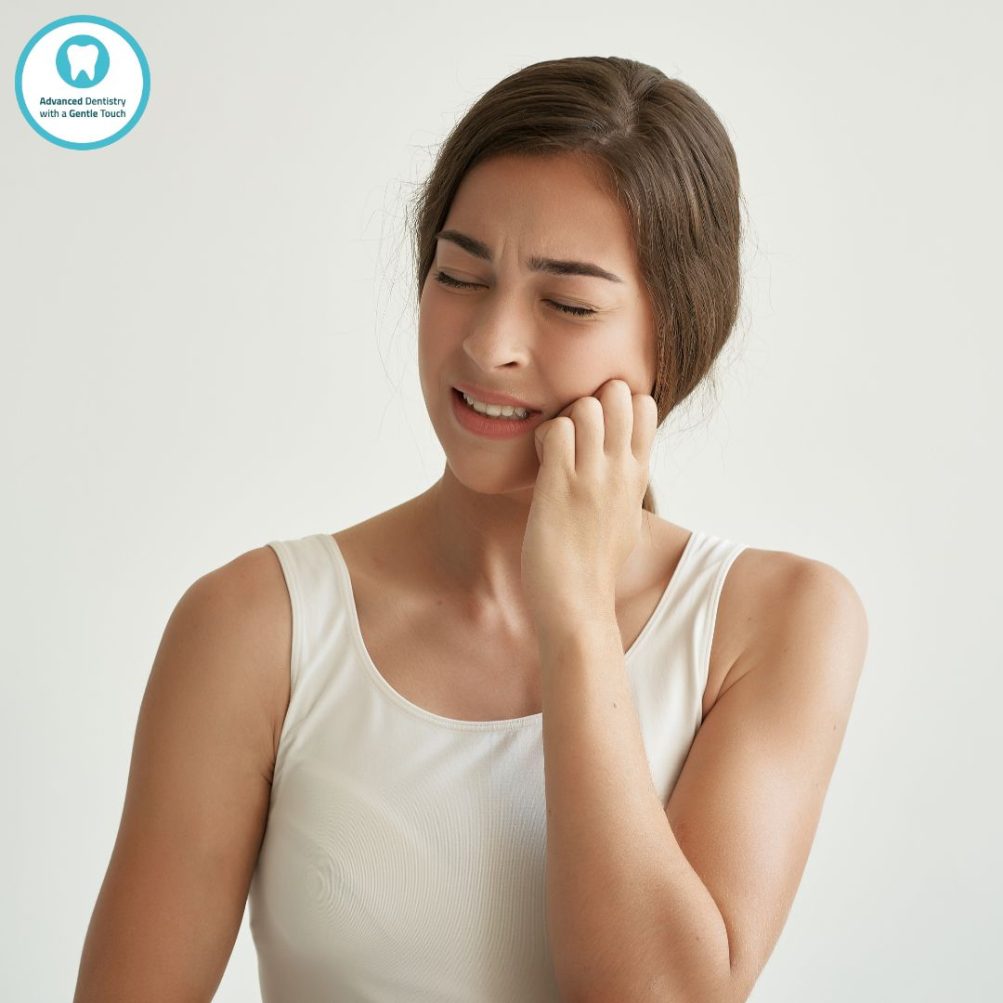 A woman with a popping jaw