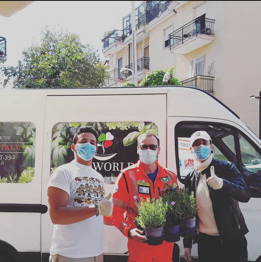 Andi, Luca selling basil with their first car