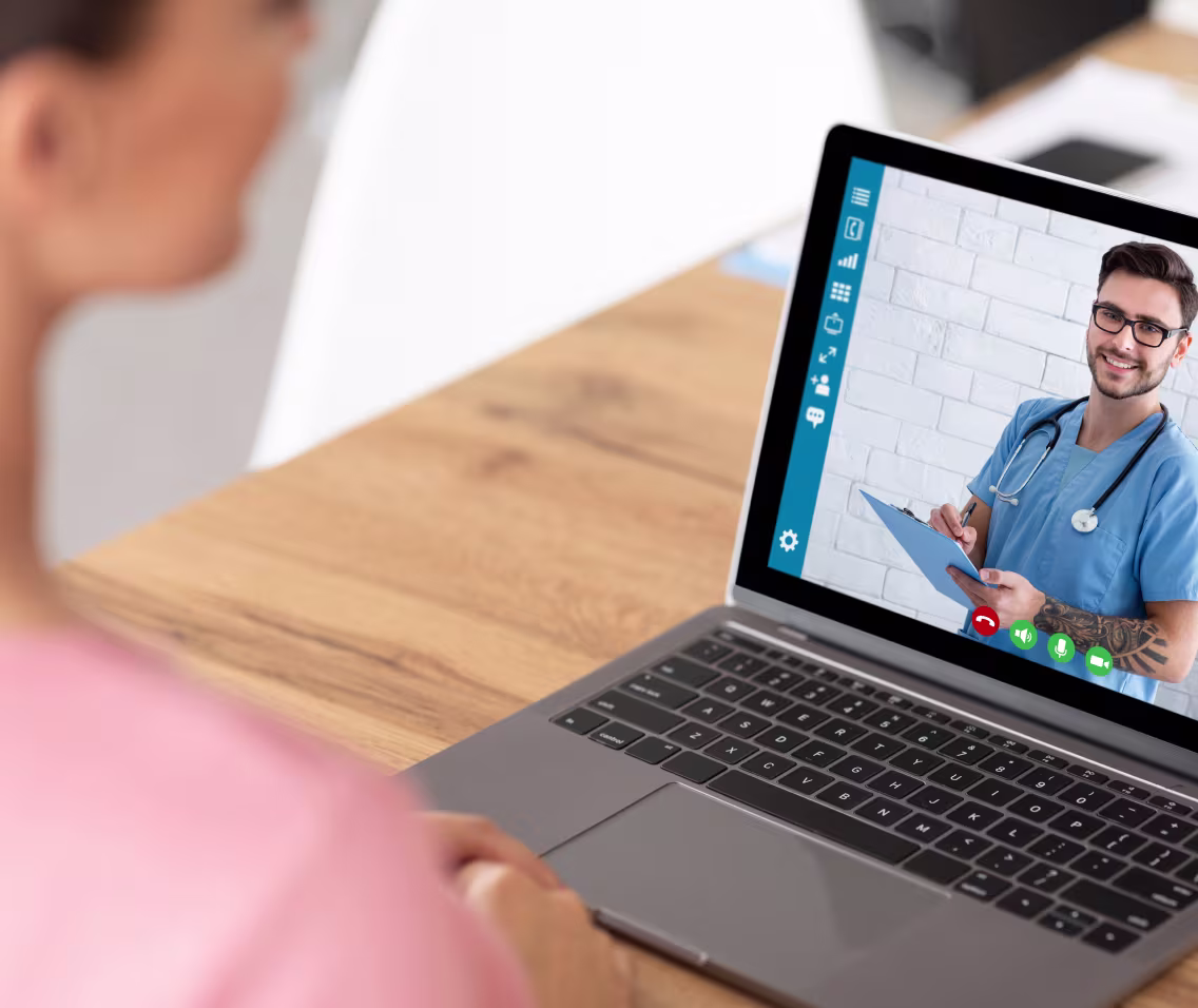 Patient having a video call with a doctor on a laptop
