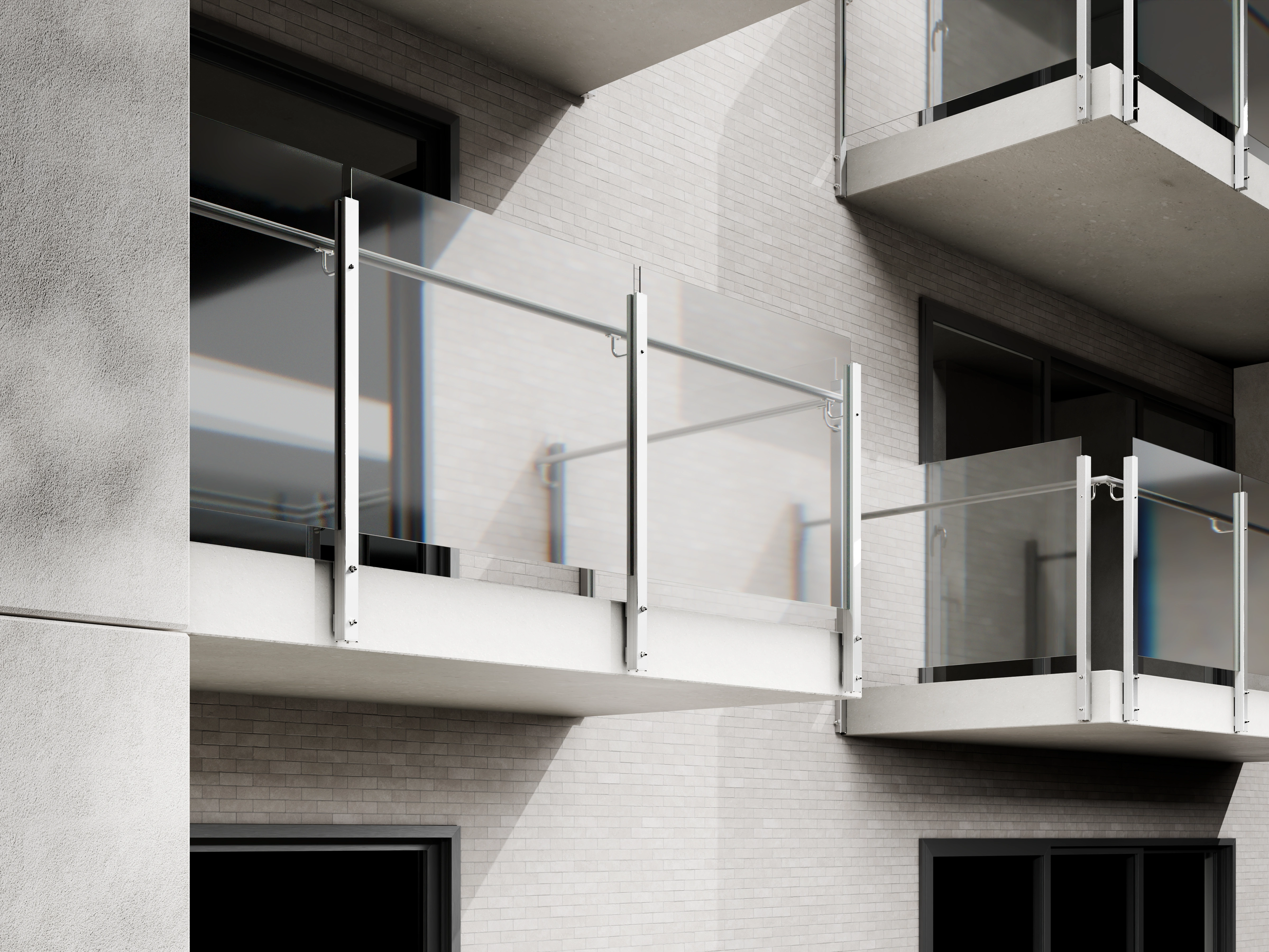 Belcanto Envoy Attaché Balustrade installed on modern apartment balconies with clear glass panels and aluminium supports
