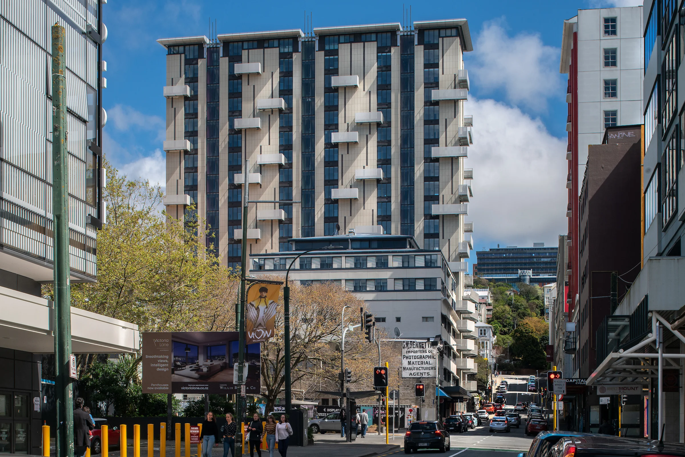 Belcanto building viewed from Dixon Street, showcasing its modern façade and repeating Sleeper balcony design.