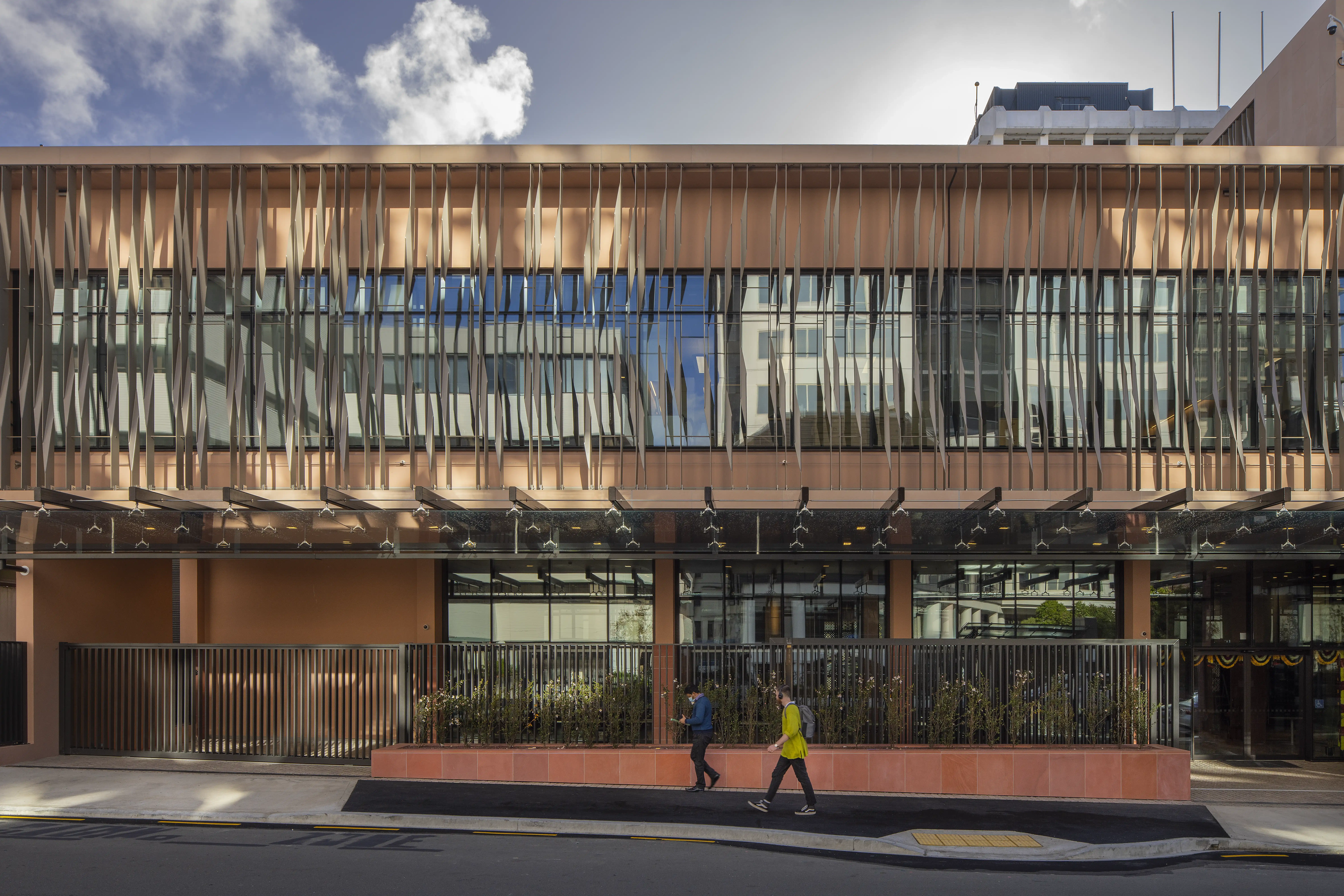 High Commission of India in Wellington, wrapped in a tracery screen of twisting aluminium facade fins