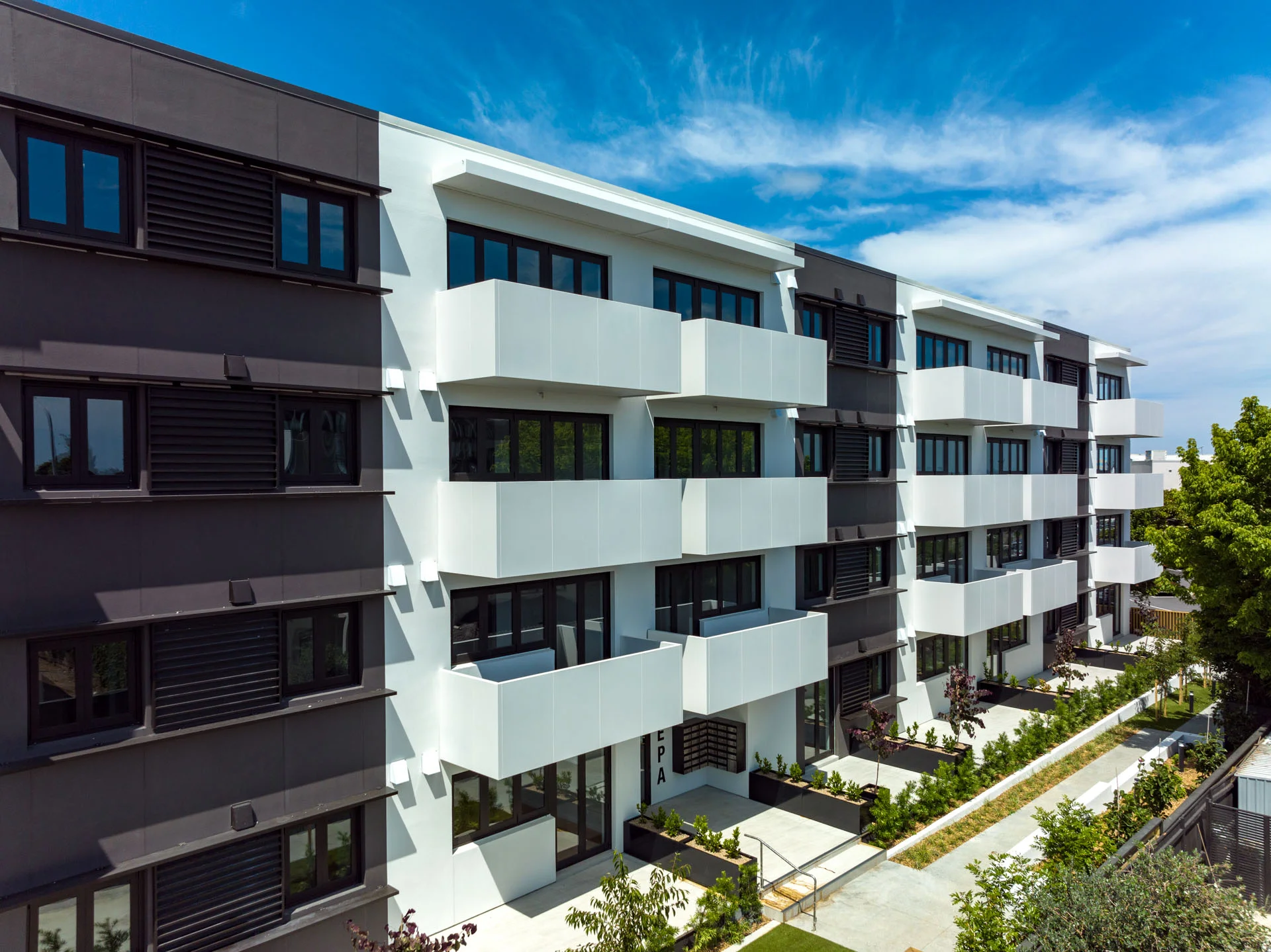 View from a balcony at The Ridge, Mission Bay, framed by a powder-coated aluminium balustrade