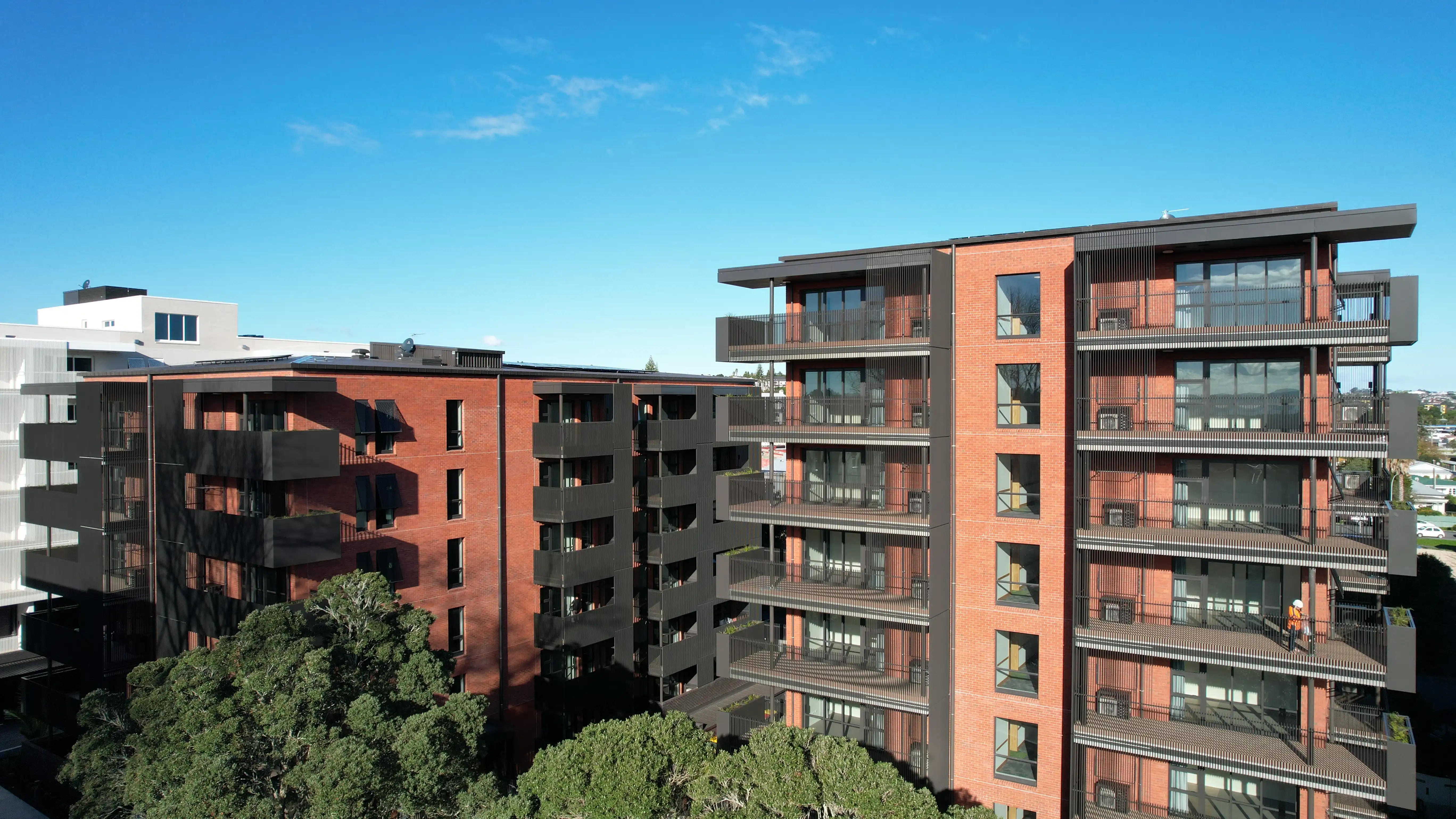 Aluminium senior housing balustrades along the balcony edges of a Kāinga Ora apartment building at Community Lane.