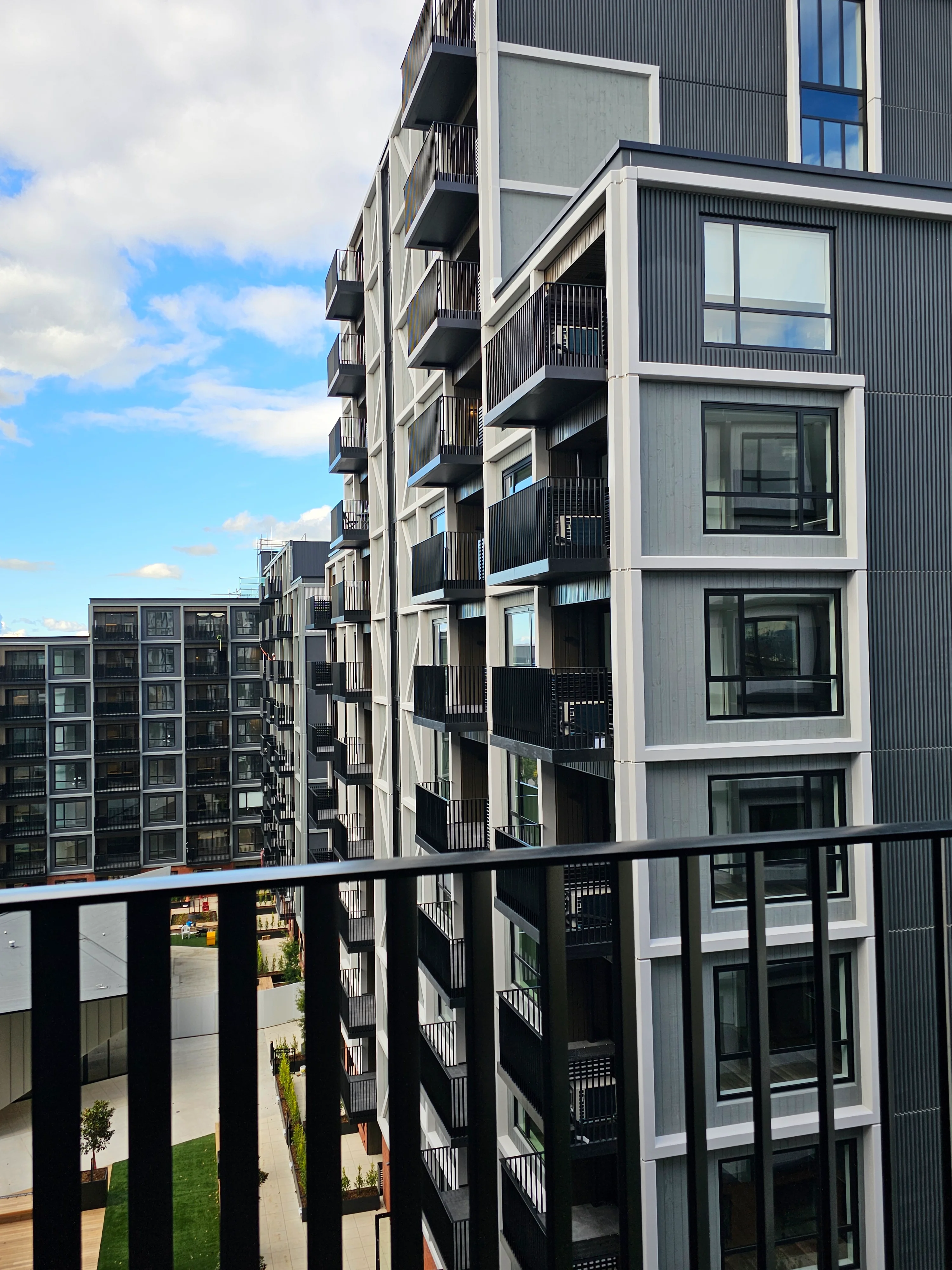 Aluminium fins set at 45 degrees on Resido's build-to-rent balustrades, creating a privacy screen effect.