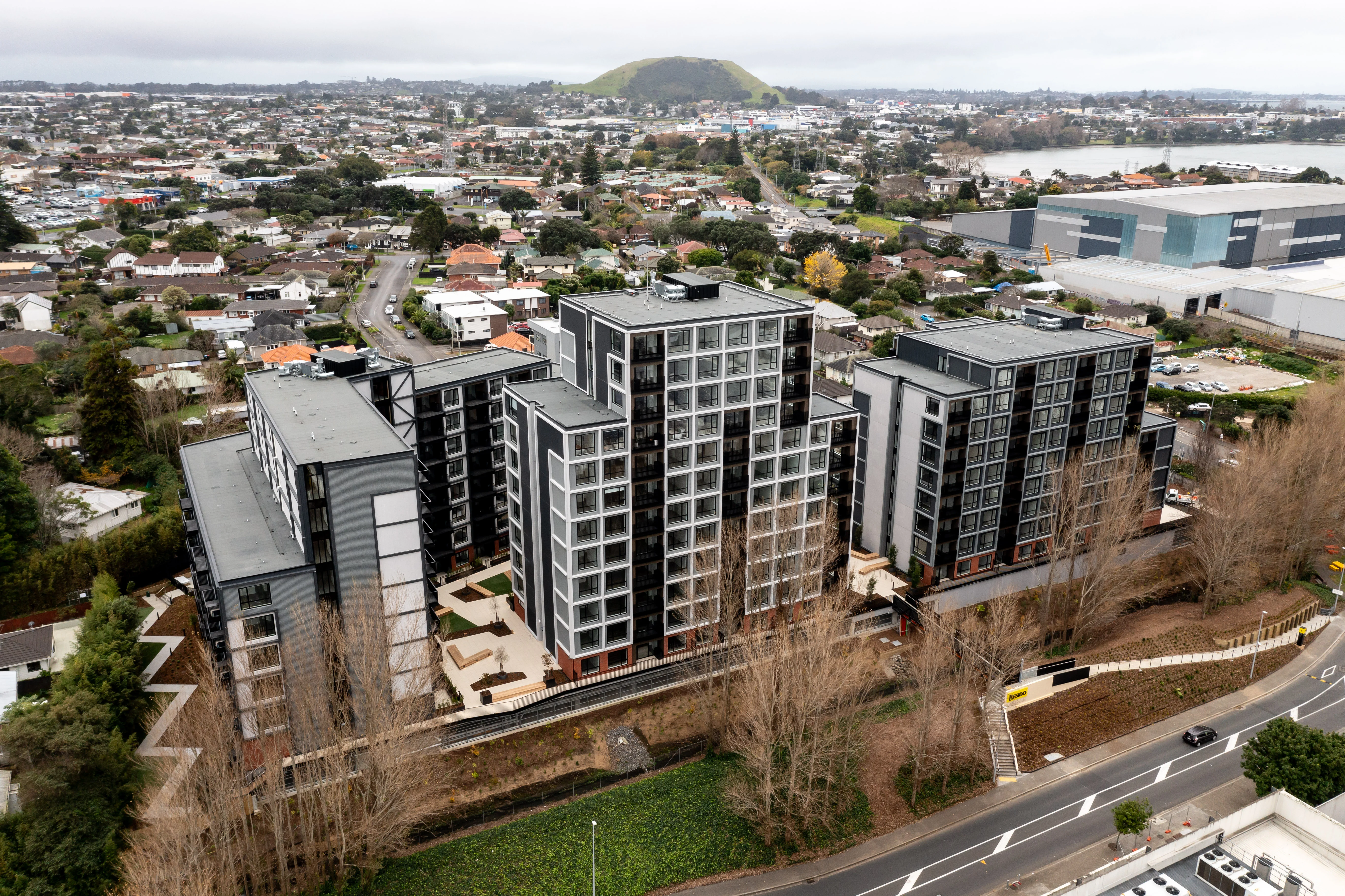 Belcanto balustrades extending from the Resido towers into the landscaped podium and shared outdoor spaces.