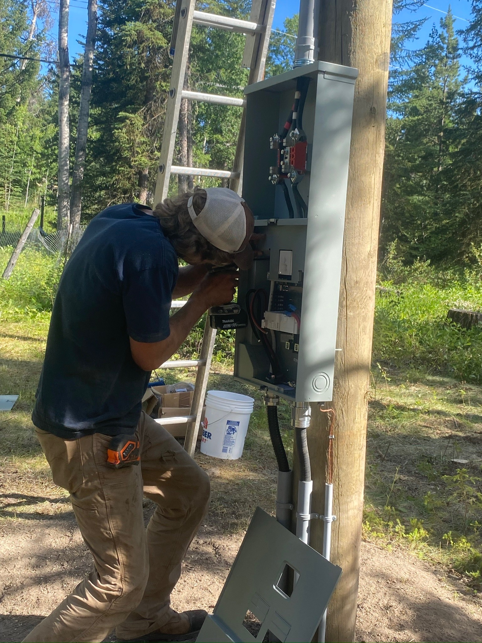 Owner installing a panel