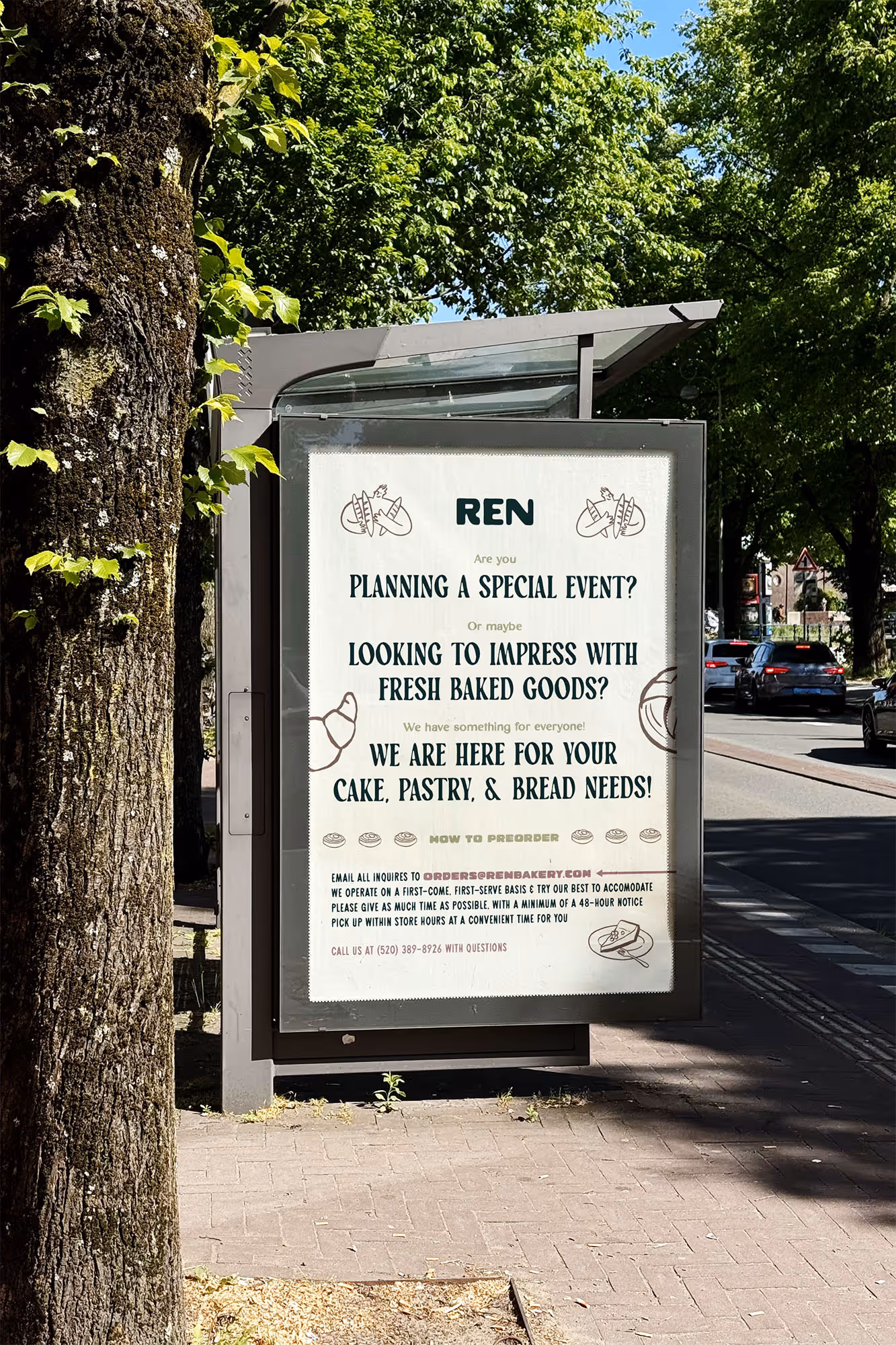 full size street ad board on tree lined street