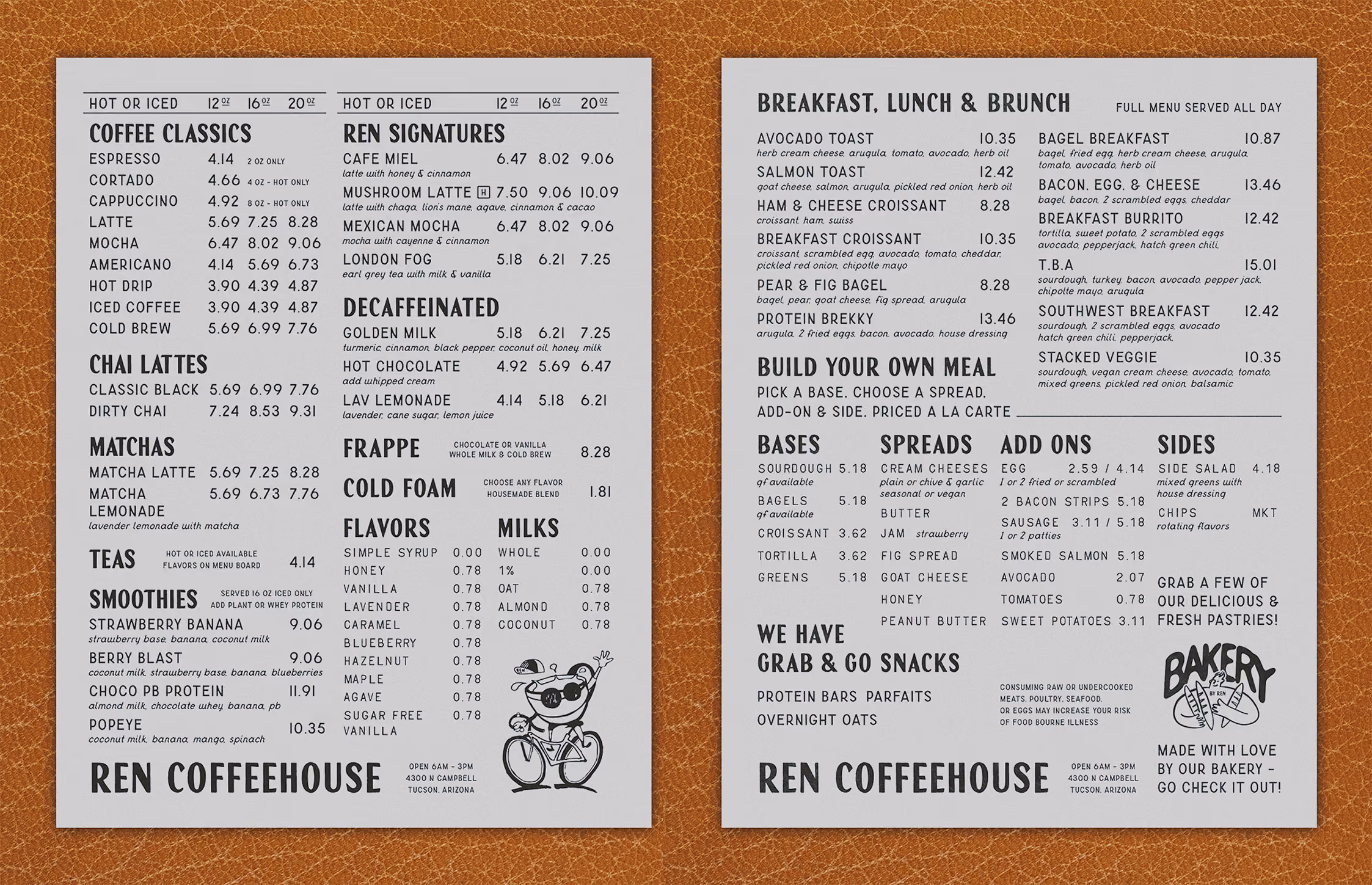 Two-page coffeehouse menu on a brown textured background. The left page lists hot or iced coffee classics, chai lattes, matchas, teas, smoothies, ren signatures including cafe mil, mushroom latte, mexican mocha, decaffeinated options, frappe, cold foam, flavors, and milks. The right page features breakfast, lunch & brunch items like avocado toast, salmon toast, ham & cheese croissant, breakfast croissant, and other meals. It also has a 'Build Your Own Meal' section, bases, spreads, add-ons, sides, and a grab & go snacks area. A drawing of a smiling dog holding a coffee mug is on the bottom right of the left page. A bakery note states products are made with love by their bakery.