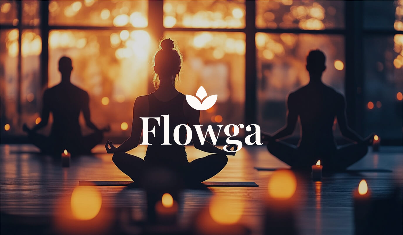 Yoga students seated for a beginner class in a modern studio – hero section for Flowga site