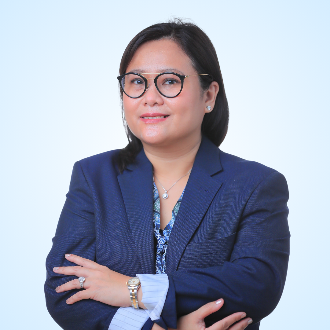 portrait of a female doctor, in navy blue coat, blue and black inner shirt