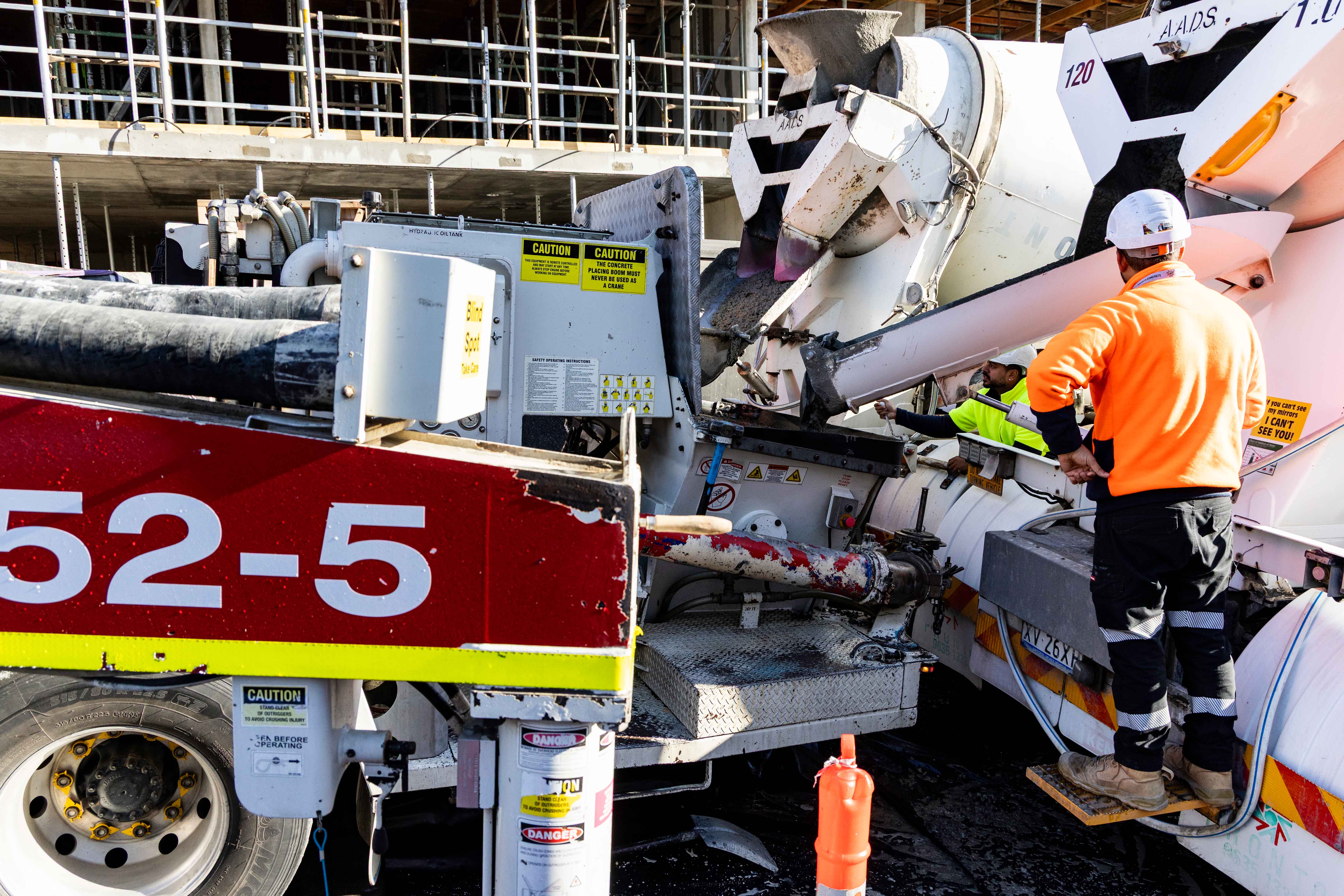 Oceana Concrete Pumping crew members working safely on a construction site in Melbourne.