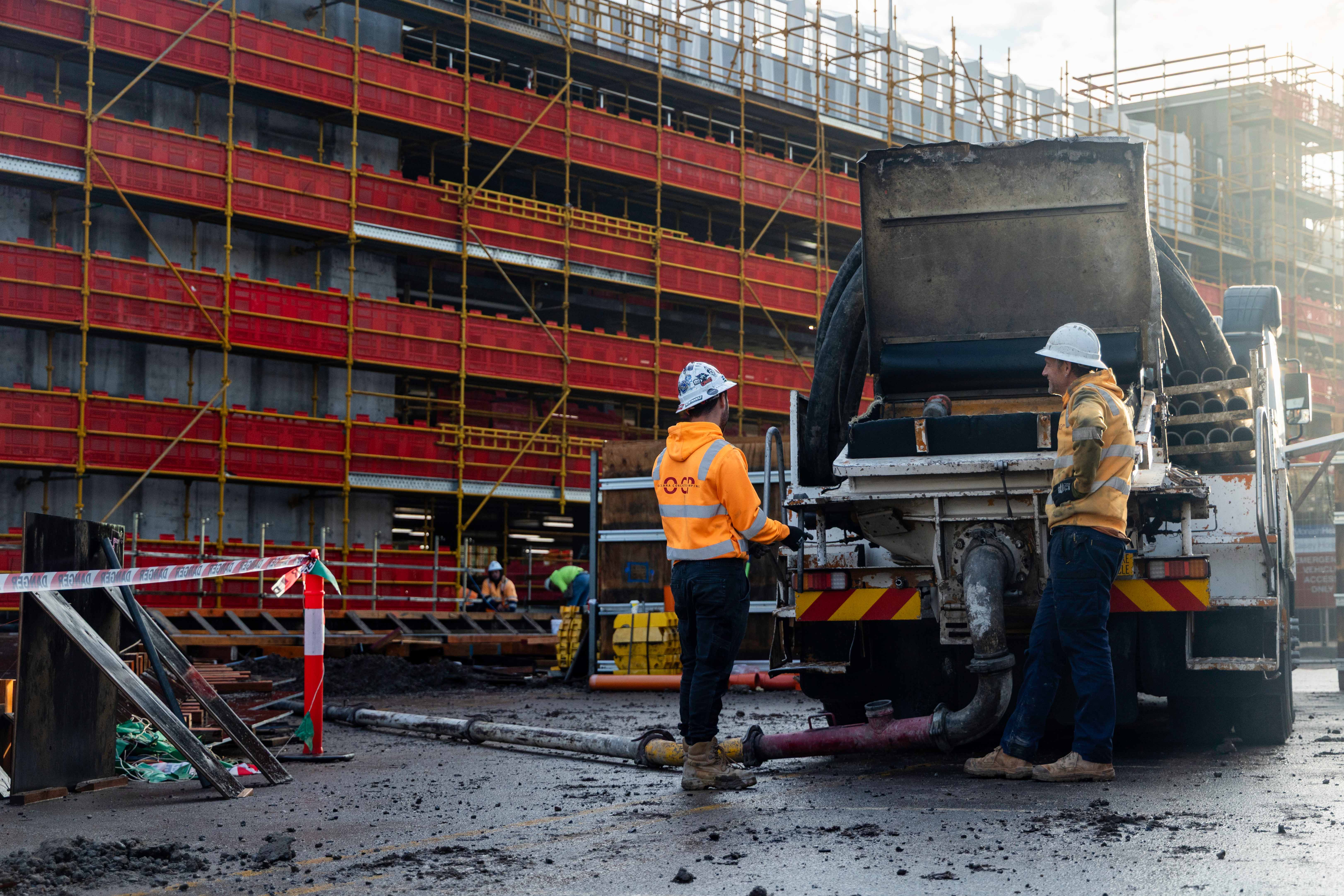 Oceana Concrete Pumping crew members working safely on a construction site in Melbourne.
